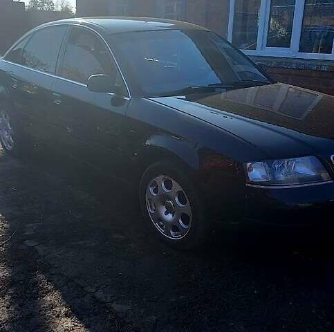 Черный Ауди А6, объемом двигателя 1.8 л и пробегом 300 тыс. км за 4500 $, фото 1 на Automoto.ua