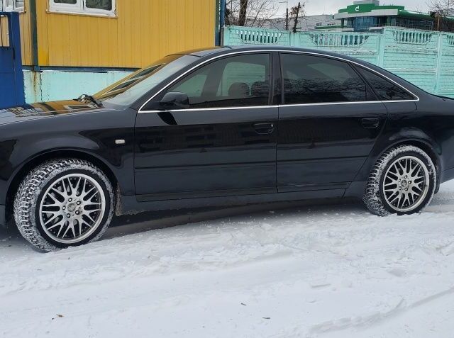 Черный Ауди А6, объемом двигателя 1.8 л и пробегом 366 тыс. км за 5000 $, фото 1 на Automoto.ua