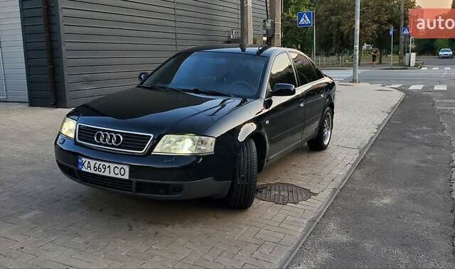 Черный Ауди А6, объемом двигателя 1.78 л и пробегом 370 тыс. км за 5300 $, фото 1 на Automoto.ua