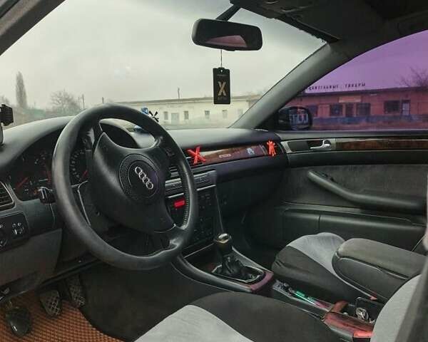 Черный Ауди А6, объемом двигателя 1.9 л и пробегом 256 тыс. км за 3800 $, фото 1 на Automoto.ua