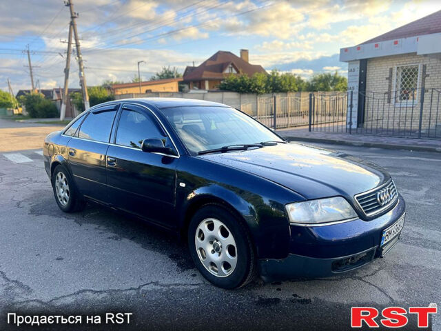 Черный Ауди А6, объемом двигателя 2.5 л и пробегом 308 тыс. км за 2600 $, фото 1 на Automoto.ua