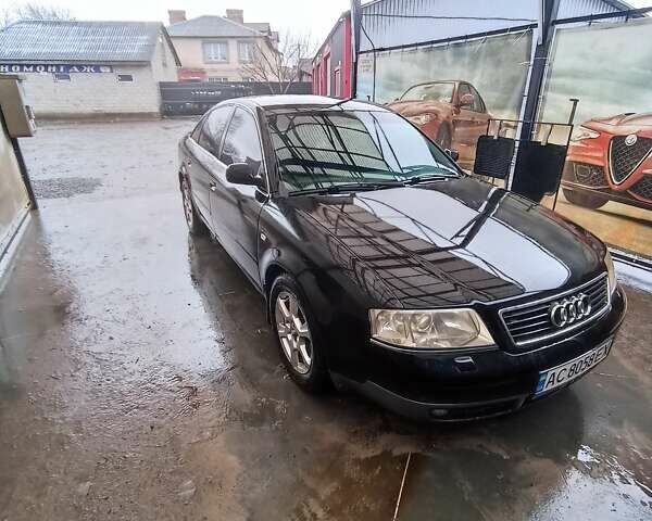 Черный Ауди А6, объемом двигателя 1.8 л и пробегом 300 тыс. км за 4800 $, фото 1 на Automoto.ua