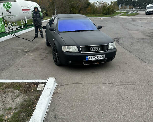 Черный Ауди А6, объемом двигателя 1.8 л и пробегом 320 тыс. км за 5200 $, фото 1 на Automoto.ua