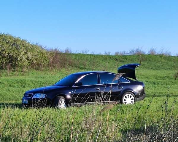 Черный Ауди А6, объемом двигателя 1.8 л и пробегом 350 тыс. км за 5200 $, фото 1 на Automoto.ua