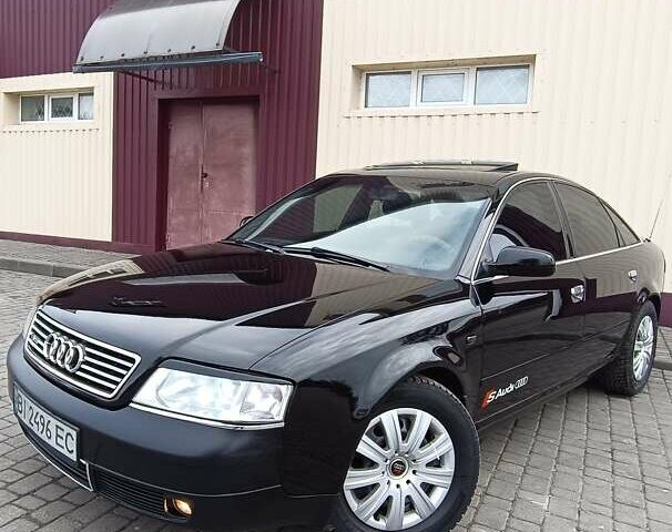 Черный Ауди А6, объемом двигателя 1.8 л и пробегом 320 тыс. км за 3500 $, фото 1 на Automoto.ua