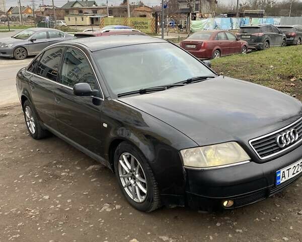 Черный Ауди А6, объемом двигателя 2.5 л и пробегом 300 тыс. км за 3000 $, фото 1 на Automoto.ua