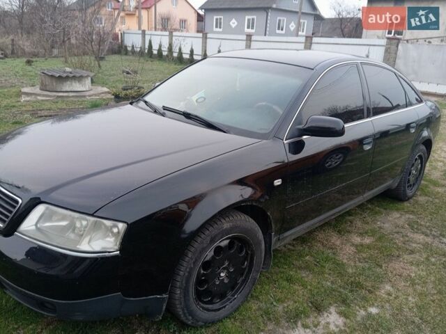 Черный Ауди А6, объемом двигателя 1.8 л и пробегом 250 тыс. км за 3800 $, фото 1 на Automoto.ua