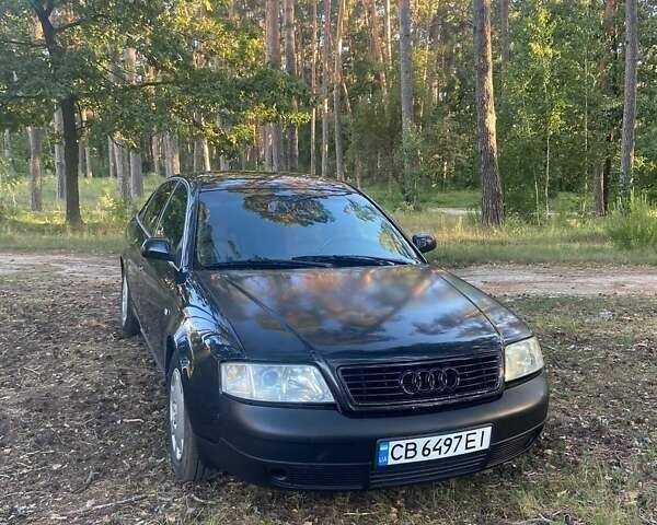 Черный Ауди А6, объемом двигателя 2.4 л и пробегом 230 тыс. км за 3700 $, фото 1 на Automoto.ua