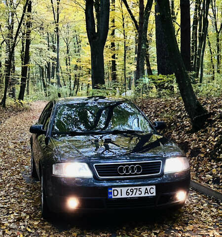 Черный Ауди А6, объемом двигателя 2.5 л и пробегом 328 тыс. км за 4100 $, фото 1 на Automoto.ua