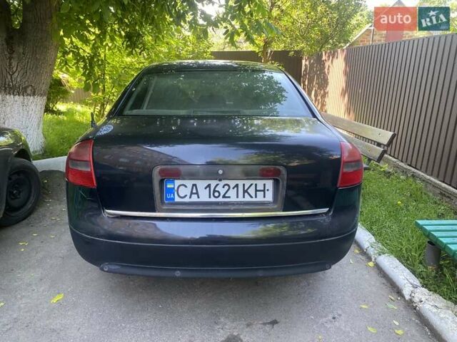 Черный Ауди А6, объемом двигателя 2.5 л и пробегом 370 тыс. км за 3000 $, фото 1 на Automoto.ua