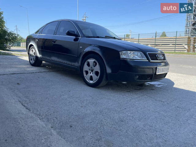 Черный Ауди А6, объемом двигателя 2.39 л и пробегом 280 тыс. км за 3800 $, фото 1 на Automoto.ua