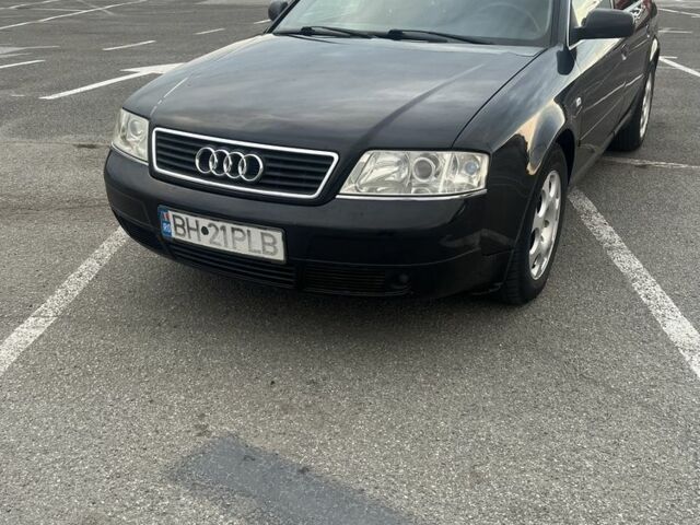 Черный Ауди А6, объемом двигателя 2.5 л и пробегом 390 тыс. км за 2000 $, фото 1 на Automoto.ua