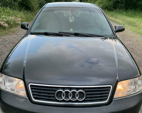 Черный Ауди А6, объемом двигателя 2.5 л и пробегом 326 тыс. км за 3700 $, фото 1 на Automoto.ua
