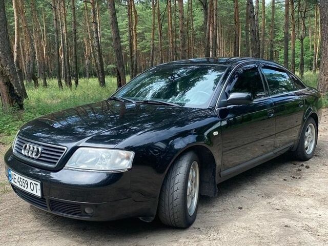 Черный Ауди А6, объемом двигателя 1.78 л и пробегом 558 тыс. км за 4400 $, фото 1 на Automoto.ua