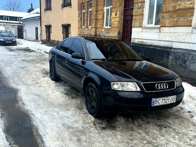 Черный Ауди А6, объемом двигателя 2.5 л и пробегом 305 тыс. км за 3850 $, фото 1 на Automoto.ua