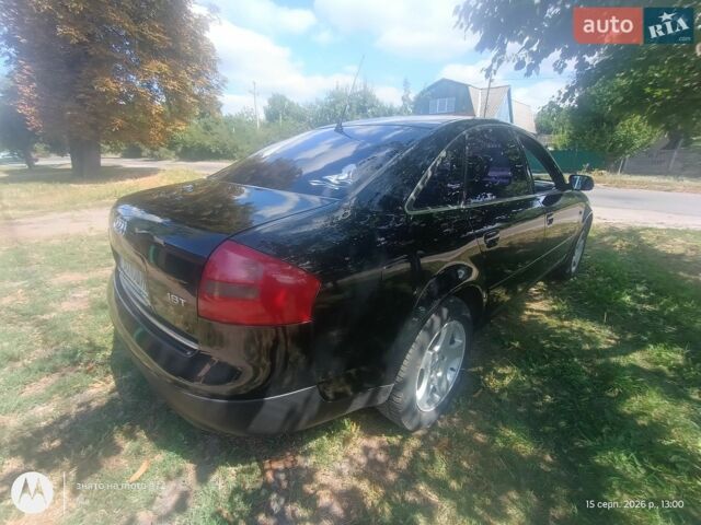 Черный Ауди А6, объемом двигателя 1.8 л и пробегом 463 тыс. км за 4400 $, фото 1 на Automoto.ua