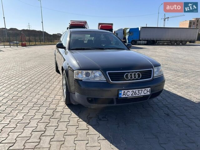 Черный Ауди А6, объемом двигателя 2.5 л и пробегом 425 тыс. км за 3000 $, фото 1 на Automoto.ua