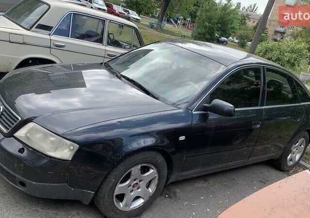 Черный Ауди А6, объемом двигателя 2.5 л и пробегом 350 тыс. км за 1500 $, фото 1 на Automoto.ua