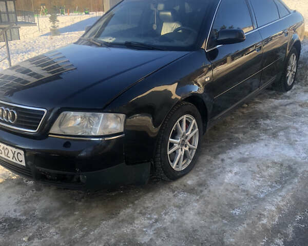 Черный Ауди А6, объемом двигателя 2.5 л и пробегом 330 тыс. км за 3800 $, фото 1 на Automoto.ua