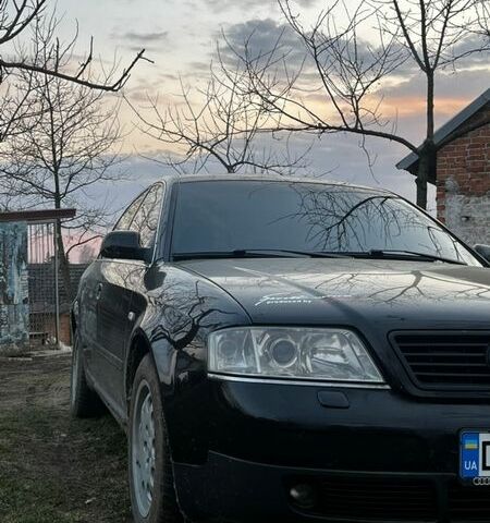 Черный Ауди А6, объемом двигателя 2.5 л и пробегом 380 тыс. км за 2800 $, фото 1 на Automoto.ua
