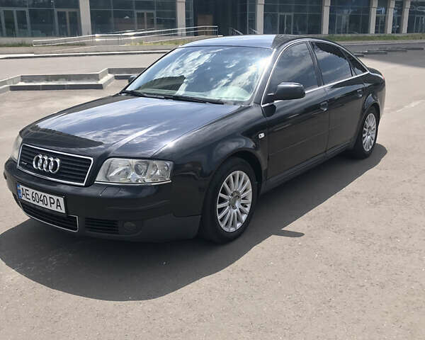 Черный Ауди А6, объемом двигателя 2.5 л и пробегом 295 тыс. км за 6500 $, фото 1 на Automoto.ua