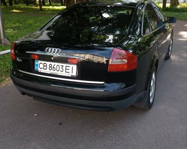 Черный Ауди А6, объемом двигателя 2 л и пробегом 217 тыс. км за 6200 $, фото 1 на Automoto.ua