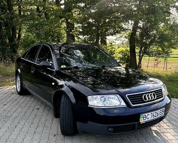 Черный Ауди А6, объемом двигателя 2.5 л и пробегом 394 тыс. км за 4200 $, фото 1 на Automoto.ua