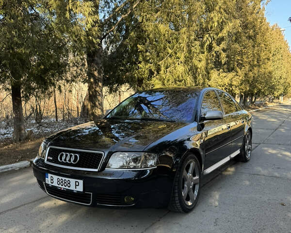 Черный Ауди А6, объемом двигателя 1.8 л и пробегом 163 тыс. км за 7200 $, фото 1 на Automoto.ua