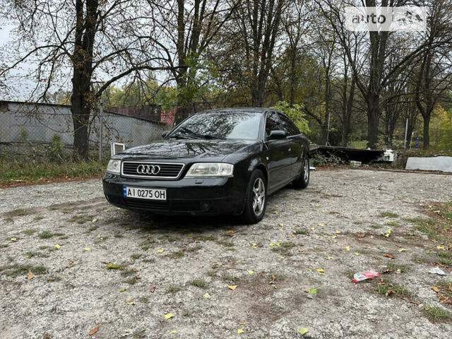 Черный Ауди А6, объемом двигателя 2.39 л и пробегом 370 тыс. км за 2850 $, фото 1 на Automoto.ua