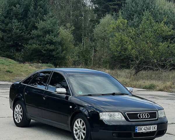 Чорний Ауді А6, об'ємом двигуна 2.39 л та пробігом 325 тис. км за 4800 $, фото 1 на Automoto.ua