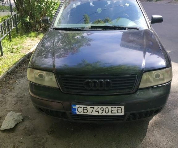Черный Ауди А6, объемом двигателя 2.5 л и пробегом 495 тыс. км за 3500 $, фото 1 на Automoto.ua