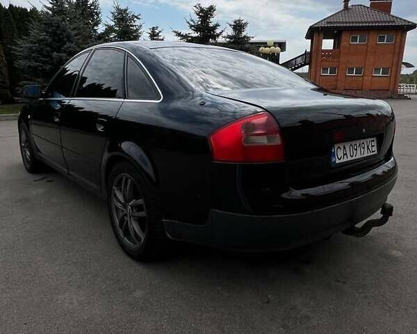 Черный Ауди А6, объемом двигателя 2.4 л и пробегом 500 тыс. км за 3500 $, фото 1 на Automoto.ua