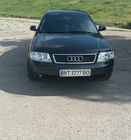 Черный Ауди А6, объемом двигателя 2.4 л и пробегом 400 тыс. км за 7500 $, фото 1 на Automoto.ua