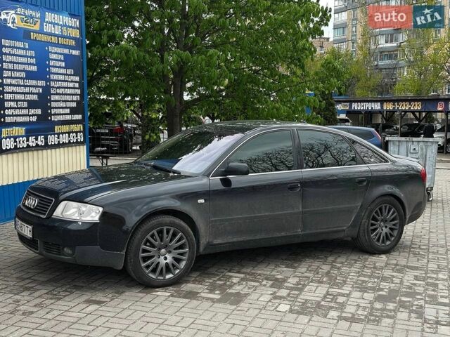 Черный Ауди А6, объемом двигателя 2.5 л и пробегом 238 тыс. км за 5000 $, фото 1 на Automoto.ua