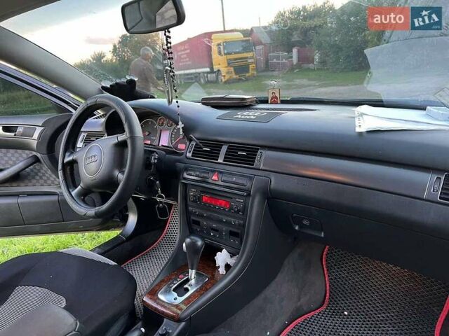 Черный Ауди А6, объемом двигателя 2.5 л и пробегом 282 тыс. км за 5700 $, фото 1 на Automoto.ua