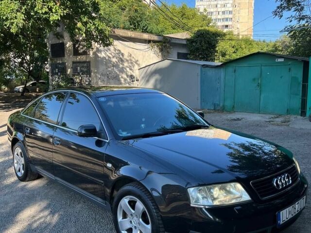 Черный Ауди А6, объемом двигателя 2.4 л и пробегом 300 тыс. км за 2700 $, фото 1 на Automoto.ua