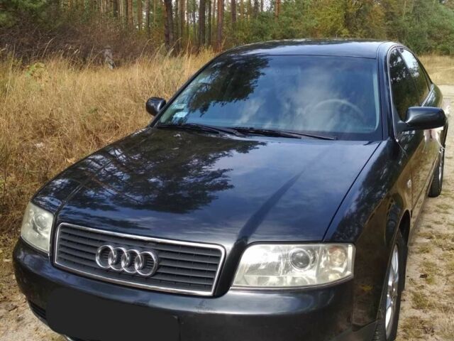Черный Ауди А6, объемом двигателя 2.5 л и пробегом 391 тыс. км за 1728 $, фото 1 на Automoto.ua