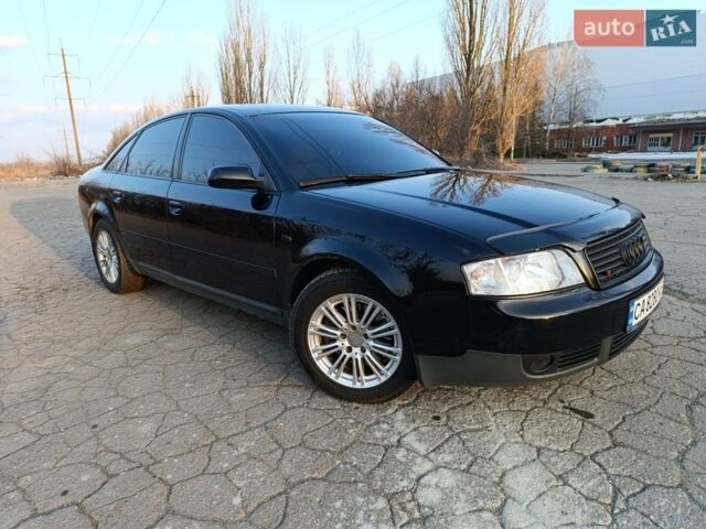 Черный Ауди А6, объемом двигателя 2.5 л и пробегом 298 тыс. км за 4900 $, фото 1 на Automoto.ua