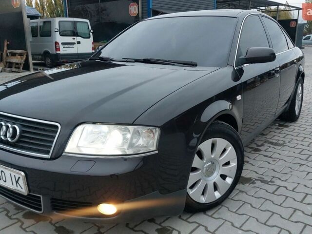 Черный Ауди А6, объемом двигателя 2.5 л и пробегом 276 тыс. км за 4300 $, фото 1 на Automoto.ua