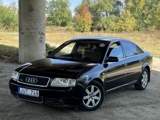 Черный Ауди А6, объемом двигателя 2.4 л и пробегом 200 тыс. км за 1999 $, фото 1 на Automoto.ua