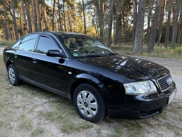 Черный Ауди А6, объемом двигателя 1.8 л и пробегом 245 тыс. км за 2450 $, фото 1 на Automoto.ua