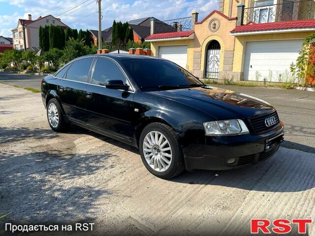 Черный Ауди А6, объемом двигателя 1.8 л и пробегом 350 тыс. км за 2800 $, фото 1 на Automoto.ua