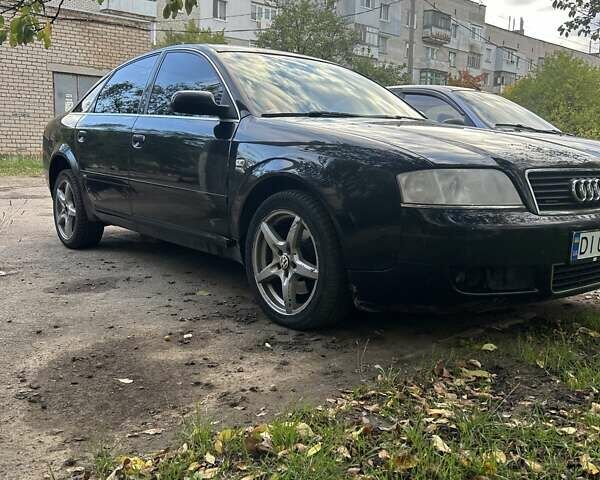 Черный Ауди А6, объемом двигателя 2.5 л и пробегом 400 тыс. км за 3900 $, фото 1 на Automoto.ua