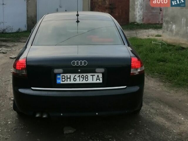 Черный Ауди А6, объемом двигателя 2.5 л и пробегом 300 тыс. км за 3500 $, фото 1 на Automoto.ua
