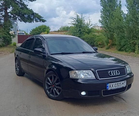 Черный Ауди А6, объемом двигателя 1.8 л и пробегом 454 тыс. км за 6200 $, фото 1 на Automoto.ua