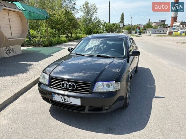 Черный Ауди А6, объемом двигателя 2.5 л и пробегом 435 тыс. км за 4000 $, фото 1 на Automoto.ua