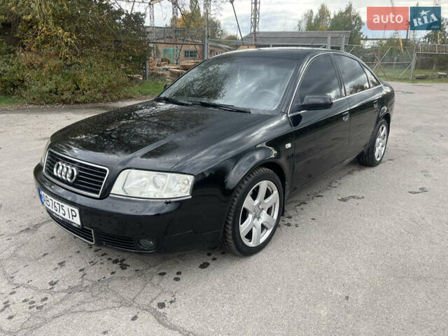 Черный Ауди А6, объемом двигателя 2.98 л и пробегом 311 тыс. км за 5500 $, фото 1 на Automoto.ua
