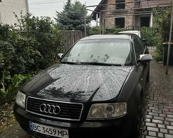 Черный Ауди А6, объемом двигателя 2.5 л и пробегом 277 тыс. км за 4000 $, фото 1 на Automoto.ua