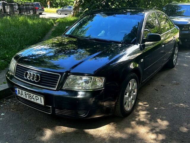 Черный Ауди А6, объемом двигателя 2.4 л и пробегом 397 тыс. км за 3700 $, фото 1 на Automoto.ua