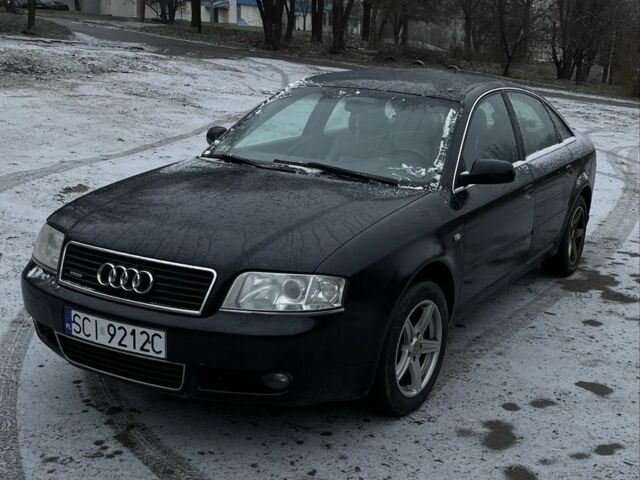 Черный Ауди А6, объемом двигателя 2.5 л и пробегом 195 тыс. км за 3030 $, фото 1 на Automoto.ua